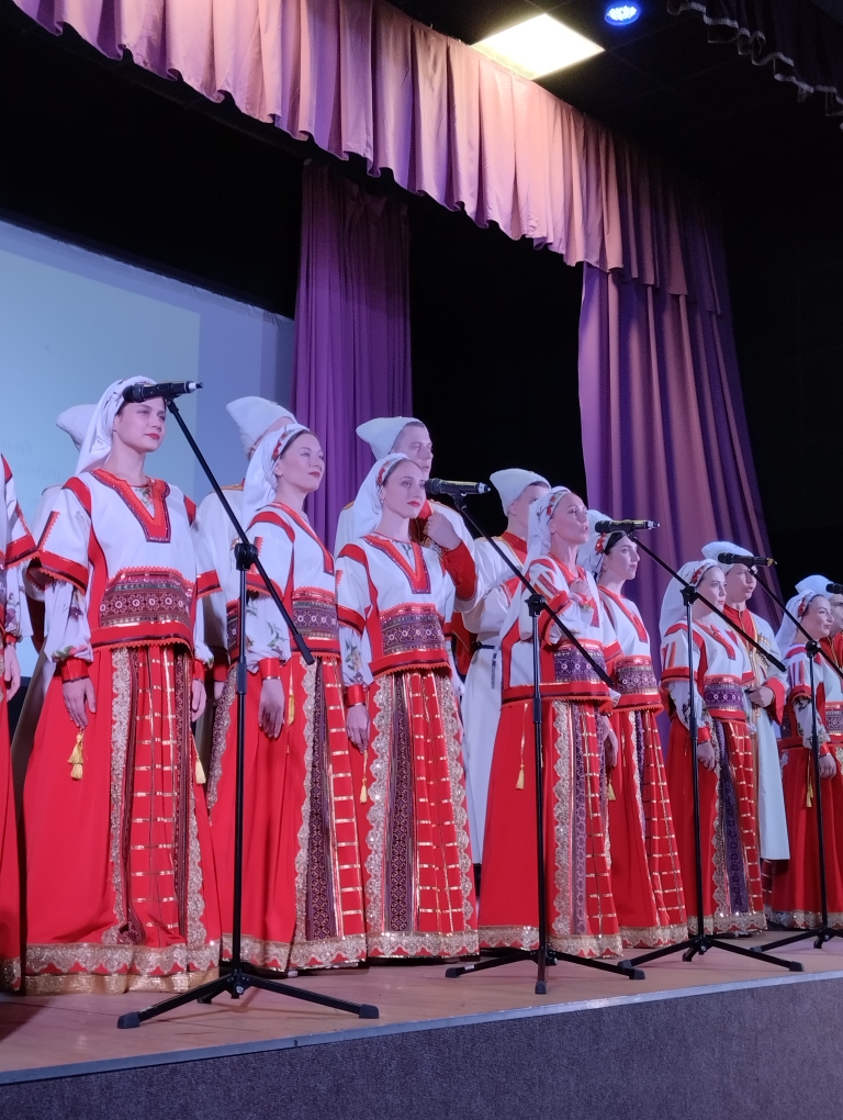 A choir performing in traditional dress.