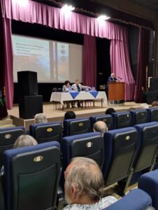 Presenters on stage at the International Forum on Cultural Heritage and Interethnic Understanding.