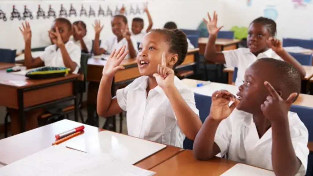 Young children engaged and participating in class in a school in Africa