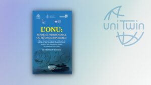 A decorative tile featuring a book in which Roger Koudé published an essay